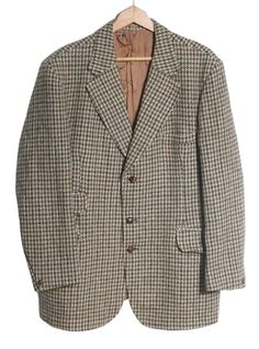 Vintage Dunn & Co dogtooth Harris Tweed jacket. This is an original from the 1960's. Notched lapels, four front pockets and twin vent reverse. Fully inside lined.  Condition: Excellent vintage condition. Chest: 42in Length: 33in Inside sleeve: 17in Across the shoulders: 18in More vintage clothing on our website www.brickvintage.com Retro Winter Tweed Jacket With Pockets, Retro Tweed Jacket With Pockets For Winter, Retro Houndstooth Blazer For Winter, Retro Houndstooth Winter Blazer, Retro Winter Houndstooth Blazer, Vintage Houndstooth Outerwear With Notch Lapel, Retro Tweed Outerwear With Notch Lapel, Fitted Vintage Outerwear With Houndstooth Pattern, Vintage Plaid Tweed Jacket