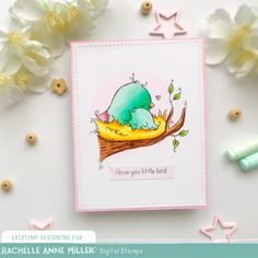 a card with an image of a baby bird in a nest on top of a branch