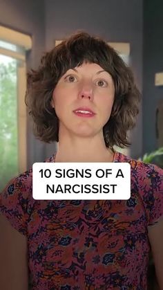 a woman with short hair is looking at the camera and has an ad for narcisst