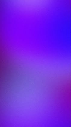 a blurry image of purple and blue colors