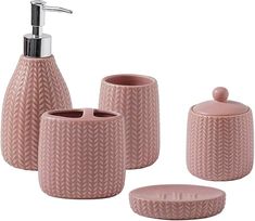 pink bathroom accessories set with soap dispenser and toothbrush holder