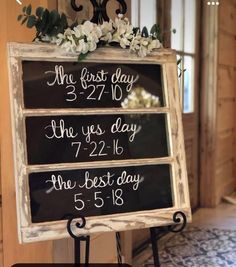 a sign that says the first day and the last day with flowers on it in front of a door