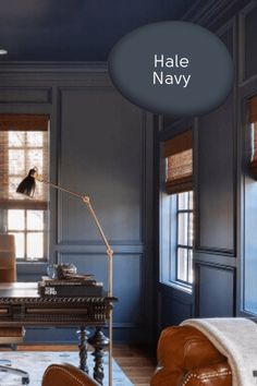 a living room filled with furniture and windows covered in shades that say hale navy