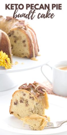 a close up of a bundt cake on a plate with a cup of coffee