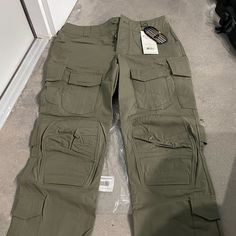 Brand New Beyond Clothing Womens Ranger Green Tactical Pants. Bought For A Family Member, Were Too Big Just Holding Them Up. Weren’t Even Tried On Or Used Forgot To Ever Return Them So Here We Are. Use Beyond Clothings Website To Get The Proper Sizing Unlike What I Did Lol Tactical Khaki Bottoms For Outdoor Activities, Techwear Cargo Pants For Outdoor Work In Khaki, Practical Khaki Cargo Pants For Outdoor, Khaki Techwear Cargo Pants For Outdoor Work, Techwear Style Khaki Cargo Pants For Outdoor Work, Tactical Cargo Pants For Hiking, Combat Cargo Pants For Outdoor Work, Tactical Khaki Bottoms For Outdoor Work, Tactical Bottoms With Side Pockets For Outdoor Work