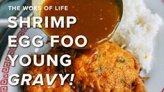 the words shrimp egg foo young gravy on a plate with rice and sauce