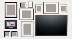 several different frames are arranged on the wall with one black and one white photo frame