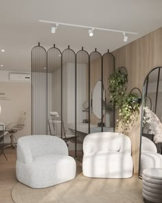 a living room filled with white furniture and lots of mirrors on the wall next to each other