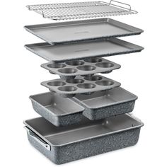 three pans stacked on top of each other with trays in the middle and an oven rack above them