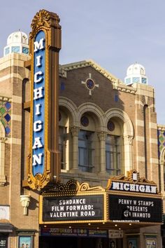 an old theater with the marquee michigan written on it