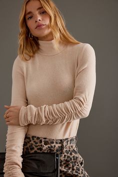 Crafted from a super soft fabric, this simple turtleneck is elevated with ruching at the sleeves. | Ruched-Sleeve Turtleneck Top by Anthropologie in Beige, Women's, Size: Medium, Polyester/Viscose/Elastane Scene Clothing, Wide Leg Jeans Cropped, Turtleneck Jumper, Straight Leg Jeans Men, Turtle Neck Jumper, Fur Coats Women, Leopard Print Blouse, Turtleneck Top, Fall Coat