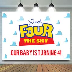 an advertisement for four the sky on a wall in a room with wooden floors and lights