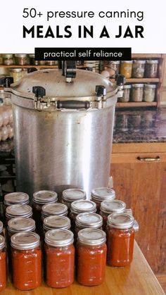 there are many jars on the table with food in them