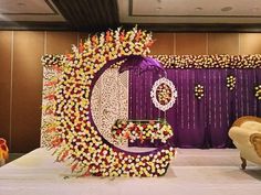 a decorated stage set up for a wedding ceremony