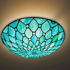 a blue stained glass ceiling light fixture