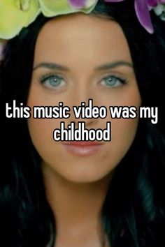 a woman with flowers in her hair and the words this music video was my childhood