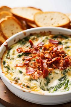 a white bowl filled with cheese and bacon