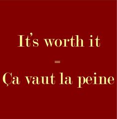 the words it's worth it = ca vaut la peine on a red background