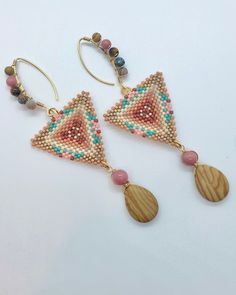 the beaded triangle earrings are made with wood and beads