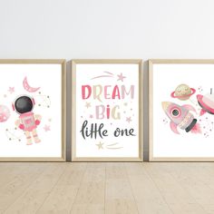 three children's wall art prints in pink, white and black with the words dream big little one on them