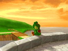 the green teddy bear is standing on top of a wall and looking at something in the distance