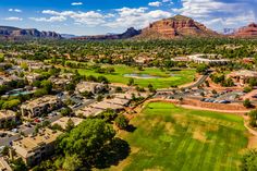 an aerial view of the golf course and mountains in sedona, arizona usa