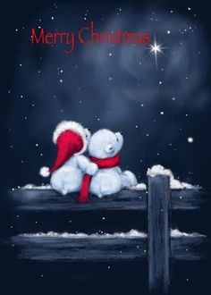 a white teddy bear sitting on top of a wooden fence under a christmas sky with stars