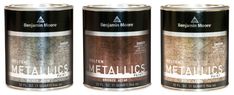 three cans of metallics are shown in this image