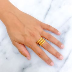 This 22k gold spiral ring, weighing 4.3 grams, is a true testament to intricate detailing and refined craftsmanship. Its yellow gold finish enhances the elegant spiral design, creating a visually captivating piece that adds depth and sophistication. Sized at 6.25 with no resizing available, it offers a snug and precise fit. Ideal for those who appreciate a blend of modern and timeless aesthetics, this ring is perfect for making a stylish yet subtle statement, making it an attractive addition to any jewelry collection. PRODUCT DETAILS Gold Purity(karat): 22k Gold Weight(grams): 4.3 Item Finish: Yellow Gold Ring Size: 6.25 Ring Sizing Available: No Bridal Jewelry Necklace, Precious Stones Rings, Diamond Pendant Sets, Modern Bracelets, Spiral Ring, Baby Earrings, Fancy Necklace, Mens Gold Rings, Fancy Rings