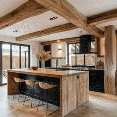 a large kitchen with wooden beams and black appliances in the center, along with two bar stools