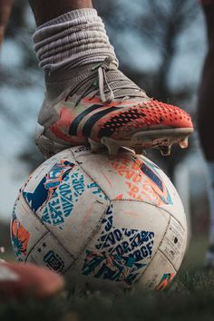 a close up of a soccer ball on the ground