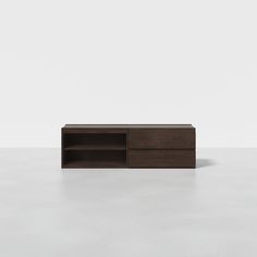 the sideboard is made out of wood and has two open shelves on one side