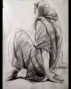 a drawing of a person sitting on the ground