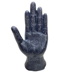 a hand statue with an all seeing eye on it's palm, against a white background