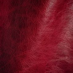 a red leather texture background that looks like it has been dyed to look like something out of