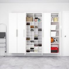 a white closet filled with lots of shoes