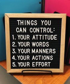 a sign that says things you can control your attitude