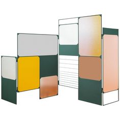 three panels with different colors and shapes on each panel, one is green, the other is yellow