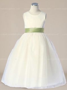 a white flower girl dress on a mannequin