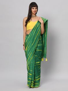 This light weight Green Tie dye saree is a versatile saree that is a must have in your wardrobe. This saree is extremely light weight will give you great pitures and can be worn for different ocassions. Team this saree up with Yellow raw silk blouse & statement earrings. Suitable for Poojas, Day function, brunhes, Wedding & haldi functions. Product Features: Saree Color: Green & yellow Blouse Color: Yellow Saree Fabric: Georgette silk Blouse Fabric: Raw Silk Saree Work: Tie Dye Print Wash Care: Designer Green Slub Silk Dupatta, Festive Green Slub Silk Lehenga, Green Slub Silk Lehenga With Dupatta, Traditional Green Slub Silk Pre-draped Saree, Green Slub Silk Blouse For Navratri, Unstitched Pista Green Cotton Silk Pre-draped Saree, Green Cotton Silk Dupatta For Navratri, Green Slub Silk Lehenga For Navratri, Green Cotton Silk Lehenga For Eid