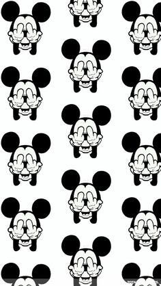 an image of mickey mouse faces on a white background with black and white circles in the middle