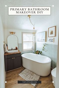 a bathroom with a white bath tub sitting next to a sink and mirror on the wall