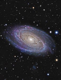 an image of a spiral galaxy in the sky