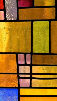 a stained glass window with different colors and shapes