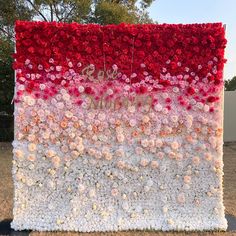 a large flower wall with flowers on it