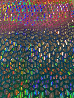 an image of shiny material that is very colorful