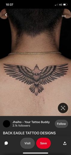 the back of a man's neck with an eagle tattoo on his upper and lower chest