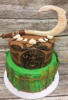 a decorated cake with an animal on top