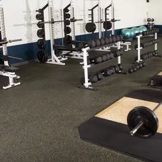 a gym filled with lots of weight machines