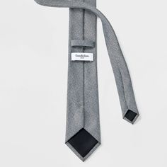 Add classic flair to your formal outfits with this Plaid Necktie from Goodfellow & Co™. This necktie is woven from lightweight fabric with full lining for comfortable wear. Pair it with your favorite dress shirt, trousers and suit jacket to complete your look for a variety of formal or semi-formal occasions. Goodfellow & Co™: Feel good in what you wear, anywhere. Elegant Black Ties For Business Casual, Elegant Black Business Casual Ties, Classic Fitted Cotton Neckwear, Dapper Fitted Neckwear For Semi-formal Occasions, Fitted Standard Tie For Black Tie Events, Dapper Cotton Suit And Tie Accessories For Formal Occasions, Classic Gray Suit And Tie Accessories, Classic Cotton Suit And Tie Accessories For Business, Fitted Dapper Ties For Business Casual